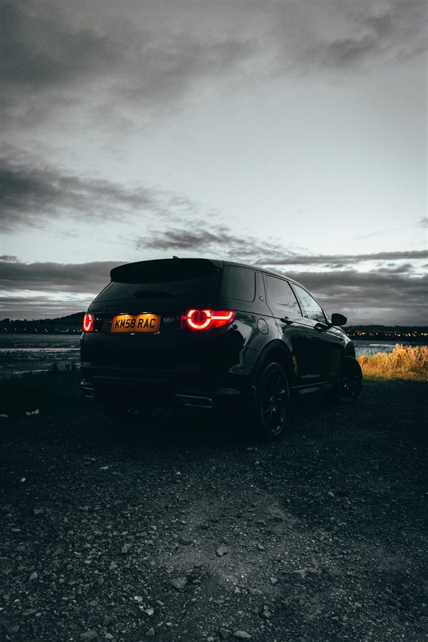 British four-wheel-drive vehicle at dusk